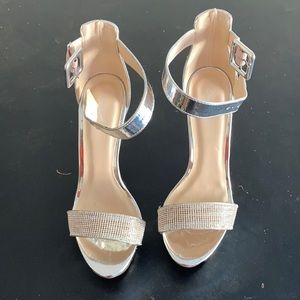 These are silver heels with diamonds on them !